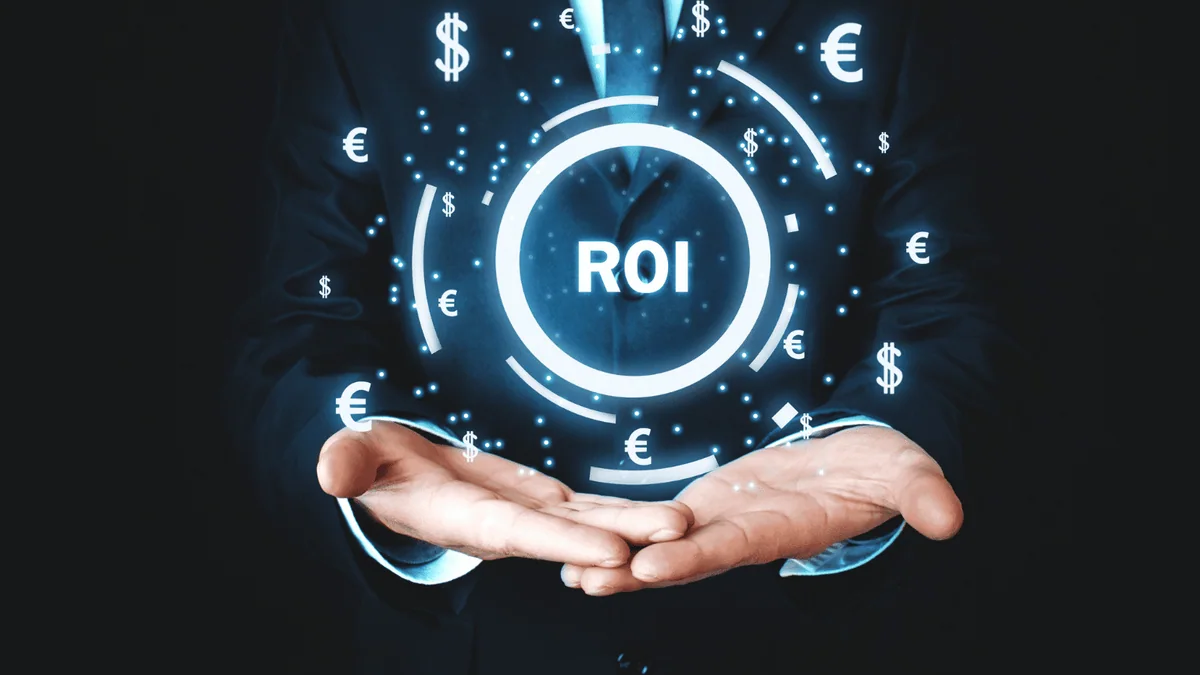 Concepto de retorno de la inversión con las siglas ROI y símbolos monetarios